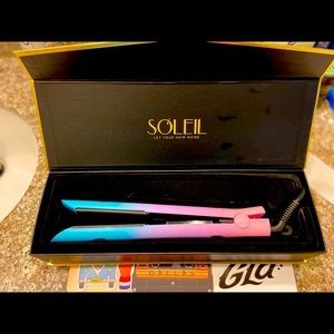 I am selling a flat iron used once, beautiful unicorn colors